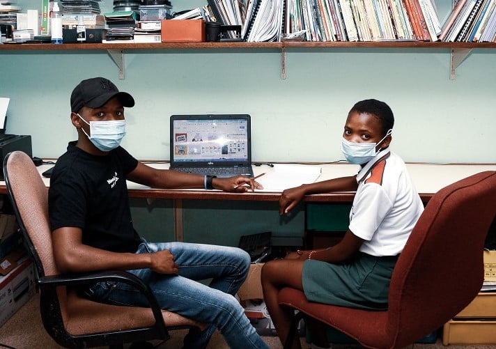 SOS Africa Charity Education Programme Graduates Othu and Olebogeng tutoring the SOS Africa children each afternoon