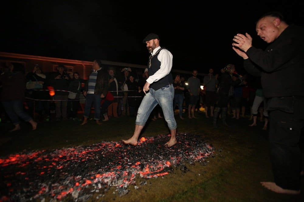 Frome Mayor Toby Eliot walking on fire for SOS Africa
