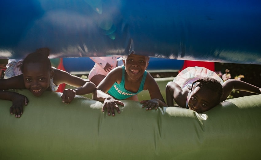 "Jumping for joy" on the bouncing castle at SOS Africa's 21st Birthday Party