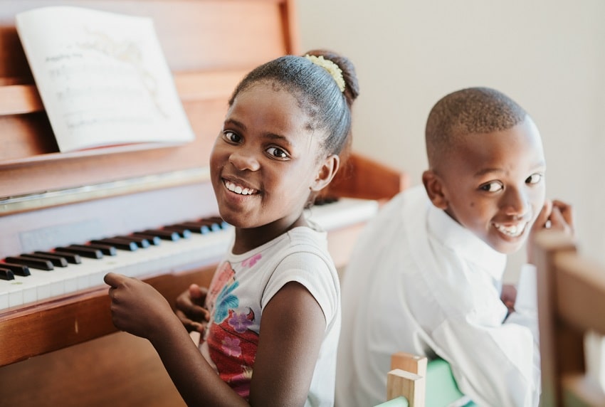 Playing the piano at SOS Africa's 21st Birthday Party Celebrations