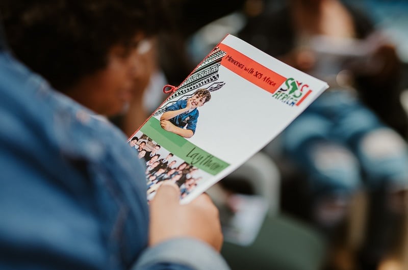 SOS Africa Charity Graduation Booklets presented to Matric Students