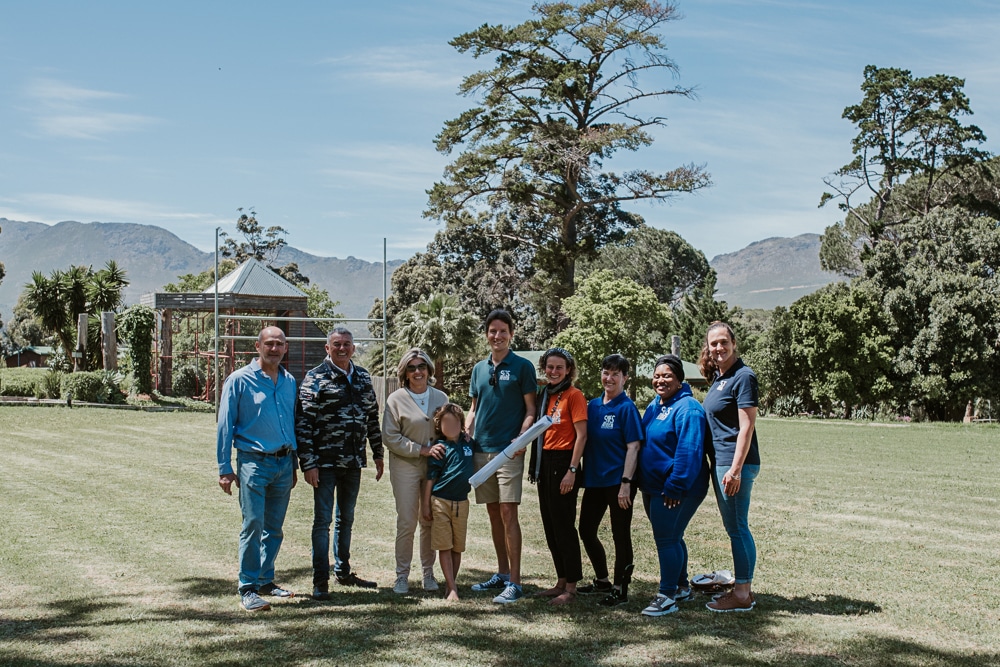 The SOS Africa and Village Collaboration staff celebrating the official signing of the OTP